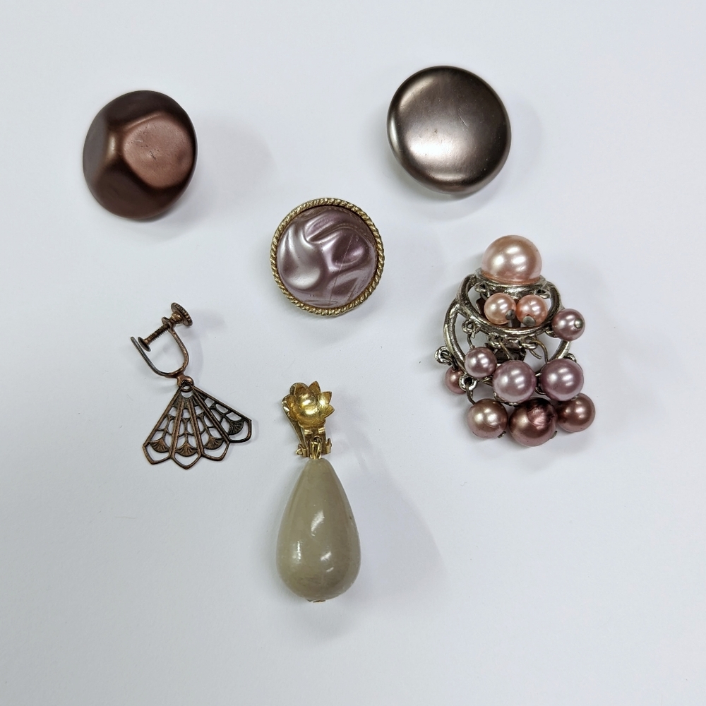 Mismatched purple clip on earrings